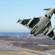 Illustration for article titled These Shots Of Fulcrums and Eurofighters Over Lithuania Are Amazing